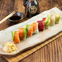 Rainbow Roll · California Roll wrap with assorted fish and avocado on top.