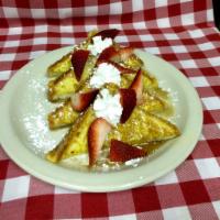 French Toast Special · Half order of french toast, two eggs and your choice of ham, applewood bacon or sausage patt...