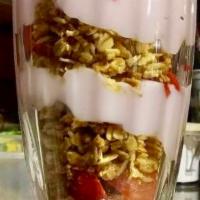 Yogurt and Granola Parfait · Low fat strawberry yogurt with granola and fresh fruit.