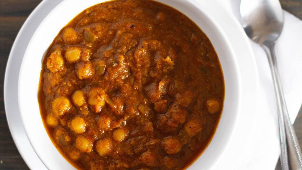Chana Masala · Garbonzo beans cooked with tomatoes, onions ＆ spices.