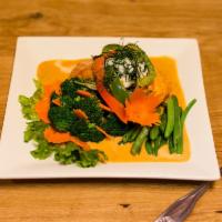 SP4. Pa-nang Salmon · Grilled salmon topped with a homemade pa-nang curry sauce, bell peppers and sweet basil.