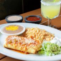 Chimichanga Classica · A large flour tortilla stuffed with your choice of meat. Fried to perfection and topped with...