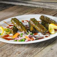 Grape Leaves Appetizer  ورق عنب  · Hand picked and wrapped grape leaves from the finest vines in Oregon. Stuffed with chopped p...