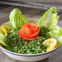 Tabouli Salad · Our delicious and popular Mediterranean salad. Finely chopped parsley with bulgur wheat, tom...
