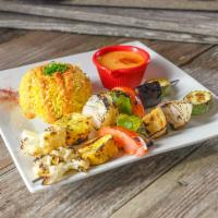 Vegetarian Kabob (Two Skewers) · A selection of fresh vegetables, grilled and served over basmati rice topped with our specia...