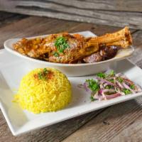 Braised Lamb Shank · Braised lamb shank in tomato sauce with vegetables. Served with rice. Gluten free.
