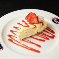 Vanilla Bean Cheesecake · Served with strawberry compote.