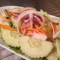 Cucumber Salad · Sliced cucumber, lettuce, white and red onion and carrot with house Thai sweet and sour dres...
