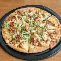 NEW 12 inch Woody's Pizza · Woody's sauce, fried chicken, mozzarella and provolone. Topped with crumbled bacon and green...