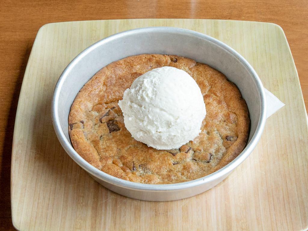 Baked To Order Jumbo Cookie · 6 inch cookie served with a scoop of chocolate or vanilla ice cream.