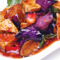 Eggplant with Bean Curd · Eggplant and tofu stir fried with garlic sauce and fresh basil. Hot and spicy.