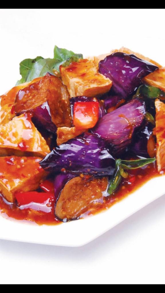 Eggplant with Bean Curd · Eggplant and tofu stir fried with garlic sauce and fresh basil. Hot and spicy.