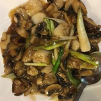 Sea Scallops mushroom · Sea scallops with three kinds of mushrooms stir fried in brown sauce.