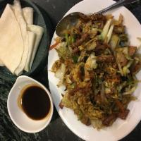 Mu Shu Pork · A combination of shredded vegetable with bamboo shoots, fungus and egg, sauteed in house sau...