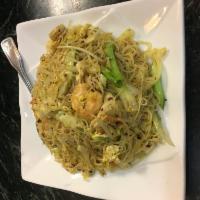 Singapore Rice Noodle with Curry · Skinny rice noodles sauteed with Chicken, shrimp, onions, carrots, celery, bean spout, cabba...