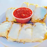 Garlic Bread with Mozzarella · Baked with our garlic with a side of house-made marinara.