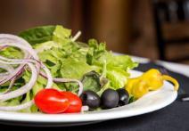 Bacino's Garden Salad · Mixed field greens and red leaf lettuce with tomatoes, cucumbers, onions, black olives, pepp...