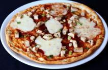 BBQ Chicken Pizza · Marinated chicken, green onions, fresh mozzarella and tangy BBQ sauce.