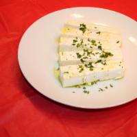 Feta Cheese · Sprinkled with oregano and olive oil. Add tzatziki for an additional charge. 