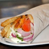 Chicken Souvlaki Pita Sandwich · Tender cubes of grilled all white meat chicken seasoned with herbs. Topped with tomato, red ...