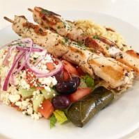 Chicken Souvlaki Platter · Two sticks of tender grilled all white meat chicken cubes seasoned with herbs. Includes a ch...