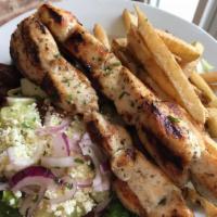 Pork Souvlaki Platter  · 2 sticks of tender grilled pork cubes seasoned with herbs. Includes a choice of rice or frie...