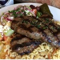 Bifteki Platter · 2 Greek style freshly ground beef patties seasoned with herbs and spices. Includes a choice ...