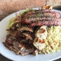 Mixed Grill Platter · Gyro, souvlaki and loukaniko. Includes a choice of rice or fries, with horiatiki salad. Serv...