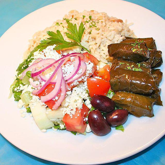 Dolmades Platter · Vegetarian. Stuffed grape leaves with rice,herbs and spices. Includes a choice of rice or fries, with horiatiki salad. Served with one pita bread and a small tzatziki sauce. 