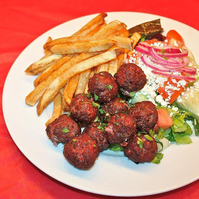 Keftedakia Platter · Greek style meatballs. Includes a choice of rice or fries, with horiatiki salad. Served with one pita bread and a small tzatziki sauce. 