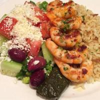 Shrimp Souvlaki Platter · 1 stick of grilled shrimp seasoned with herbs. Served with 1 pita bread and a small tzatziki...