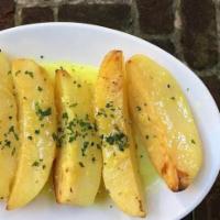 Lemon Potatoes · Baked home style lemon potato. 