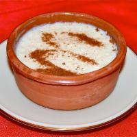 Rizogalo · Rice pudding sprinkled with cinnamon. 