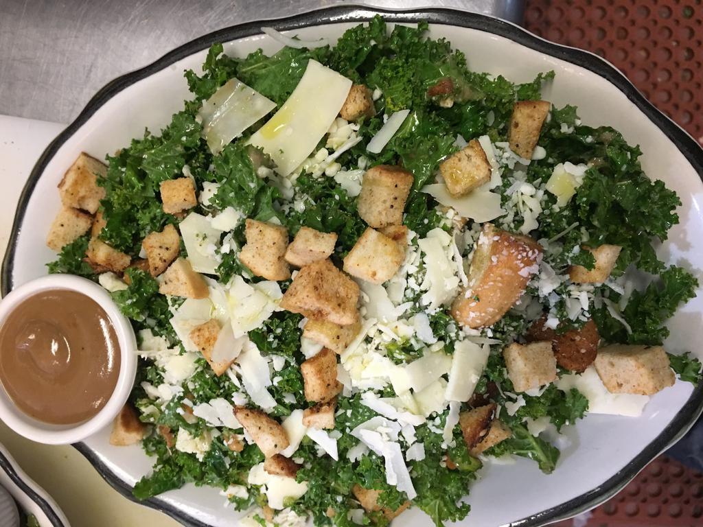 Kale and Caesar Salad · Homemade croutons, Parmesan with Caesar dressing.