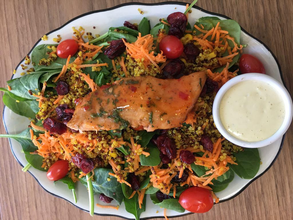 Salmon Salad · Cherry tomatoes, baby spinach, cranberry, carrot, quinoa and French mustard vinaigrette.