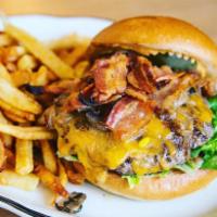 Zaca Beef Burger · Lettuce, caramelized onion, sauteed mushrooms, bacon, tomatoes, pickles, cheddar cheese and ...