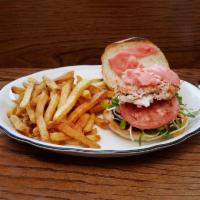 Salmon Burger · Fresh Atlantic salmon mixed with diced red onion, parsley, garlic, lettuce, sunflower sprout...