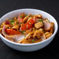 Tallarin Saltado · Stir fried juicy fettuccine with onions, tomatoes and cilantro with your choice of protein.