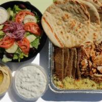 Family Meal For 4 · Comes with: 
2 Pounds of Basmati Rice 
1 Pound of Your Protein of Choice 
4 Pitas 
1 Greek S...