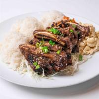 Kalbi Short Rib Plate 1LB · Steamed white rice, one pound of marinated kalbi short rib, sesame seeds, and green onions. ...