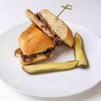 Wagyu Steak Sandwich Dip* w/ Fries · Toasted ciabatta roll, shaved wagyu steak, swiss cheese, caramelized onions, and horseradish...