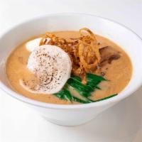 Tonkotsu Pork Ramen · Soy based pork broth, egg noodles, chashu pork, market fresh vegetables, onsen tamago, and c...
