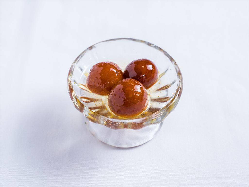 Gulab Jamun · Juicy milk balls dipped in honey syrup. 