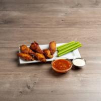 Wings · Served with blue cheese and celery.
