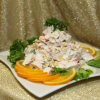 Gourmand Crab Salad · Crab meat, corn, egg, onion, and mayonnaise.