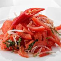 Achichuk Tomato Salad · Tomatoes, peppers, onions, seasoned with spices.