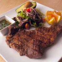 Picada Para Dos · Bbq Colombiano of cut pieces of steak, pork rinds, morcilla Colombian black sausage), Colomb...