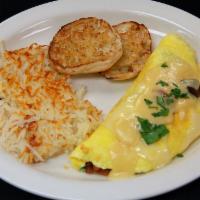 Spinach Bacon Mushroom · A large 3 egg omelet filled with fresh baby spinach, hardwood smoked bacon, house roasted cr...