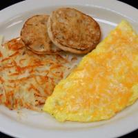 Denver · A large 3 egg omelet filled with smoked diced ham, green peppers and roasted onions topped w...