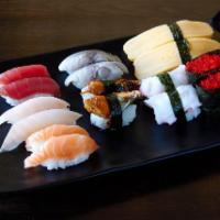 Sushi and Sashimi Combo · 7 pieces of sushi, 12 pieces of sashimi and a California roll.